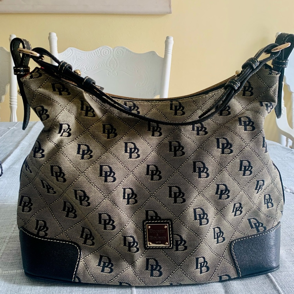 Dooney and Burke Cloth Saffiano leather.